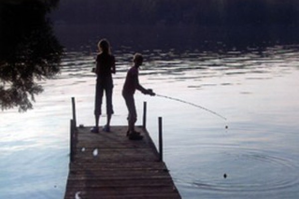 Friends fishing from the dock
