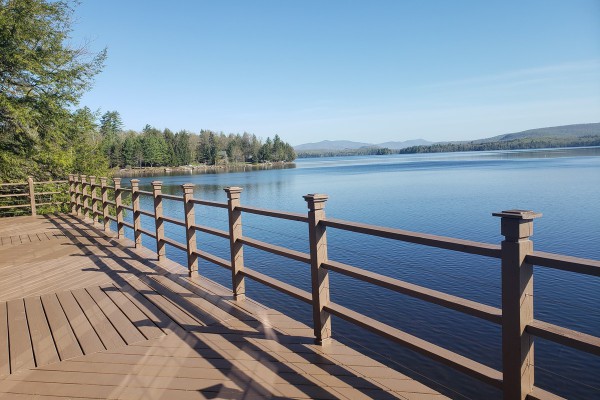 Large deck overlooking the lake, plenty of deck /chairs