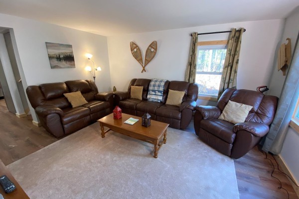 Living Room with leather reclining couch and chair  