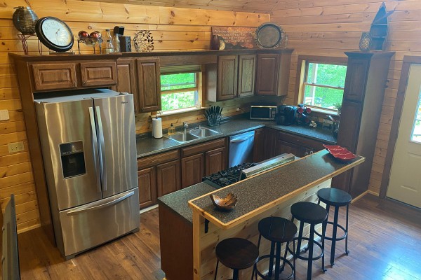 Fully stocked kitchen with stainless appliances