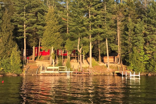 106' of lakefront with staircase, docks, & lean-to