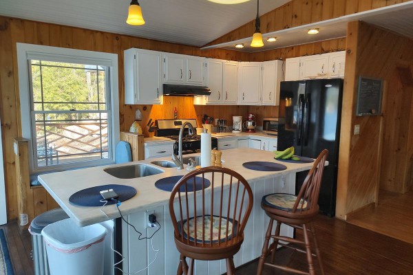 Kitchen Island, Cabinets, Frig and Stove