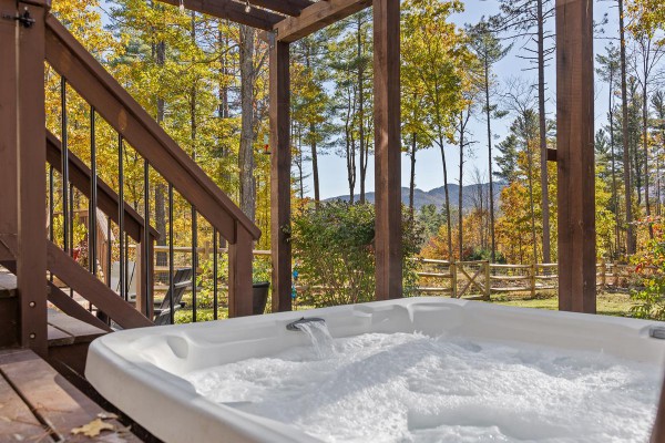 Take in picturesque mountain views in a hot tub for 5.