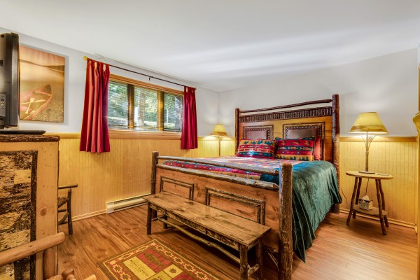 Our king bedroom for 2, with a TV on opposite wall!