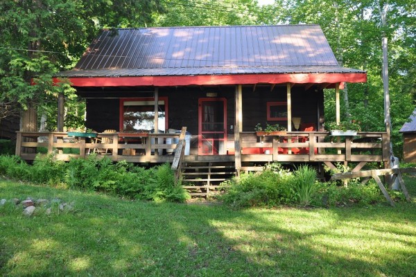 A comforable porch for reading, crafts, or meals.