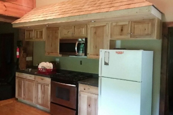 A new Kitchen with hickory cabinets.
