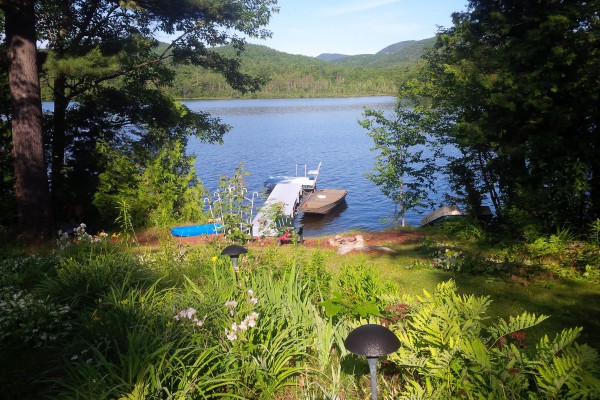 Private yard, lakefront, dock, paddleboat and rowboat