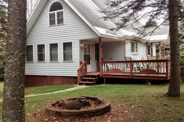 Main house, fire pit and large porch