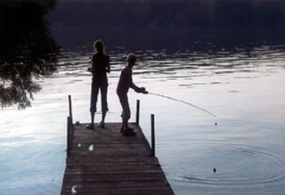 Friends fishing from the dock
