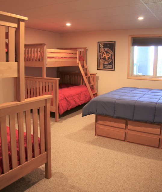 Bunkroom in Basement with king bed and two bunk beds
