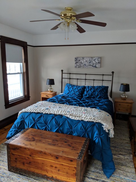 Mix of new beds/linens & antiques makes it warm & comfy
