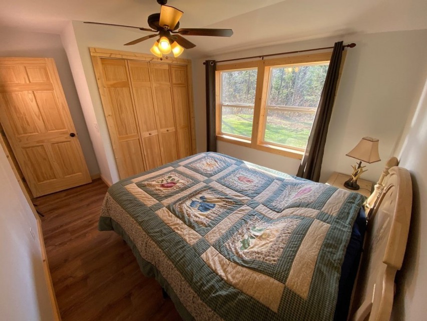 Master bedroom with queen bed