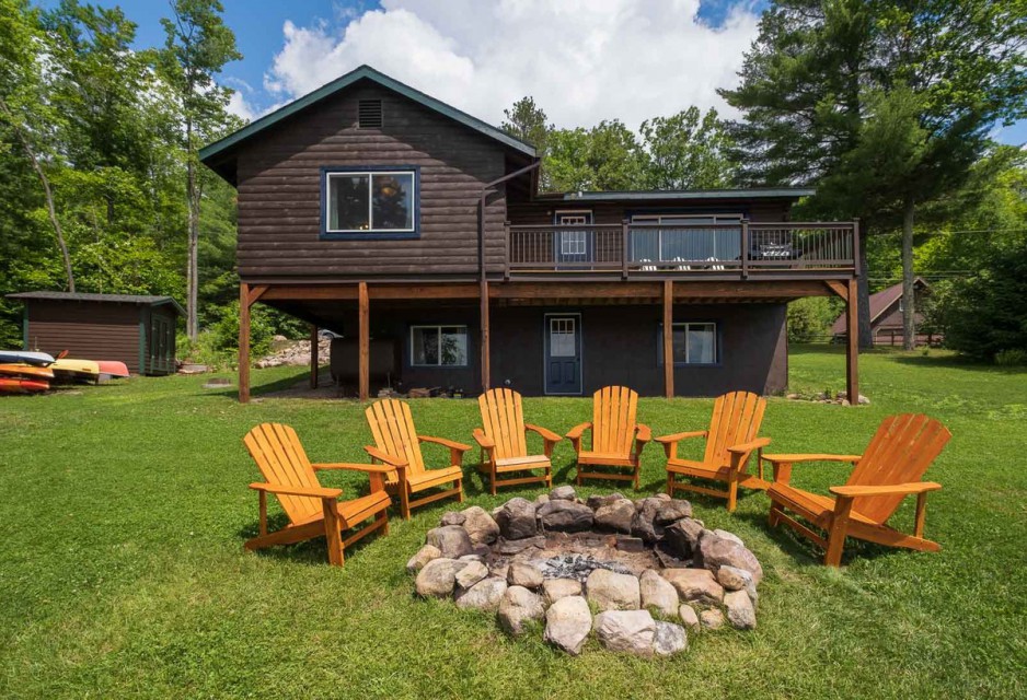 Large Outdoor Fireplace and Provided Watercrafts