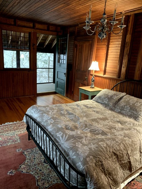 Master Bedroom with private 2nd story screened porch