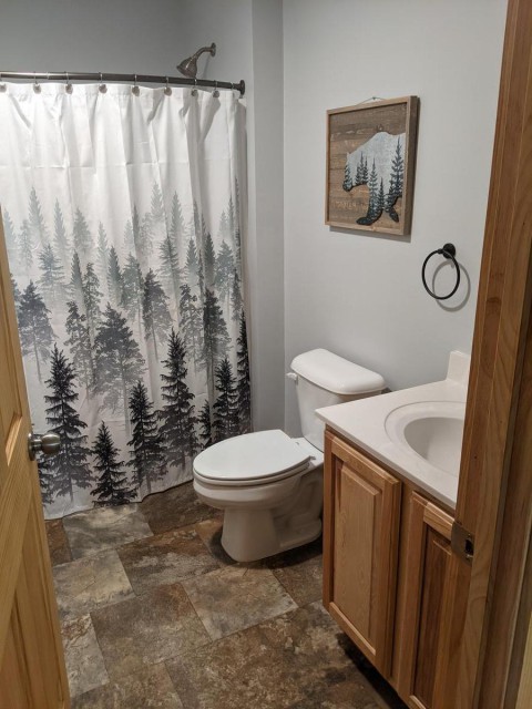 First floor hall bathroom with tub