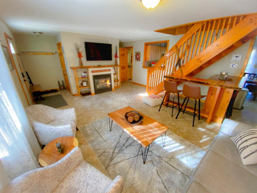 Living room with gas fireplace and boots dryer 