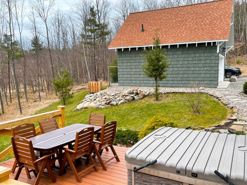 There is a path from the house to the carriage house.