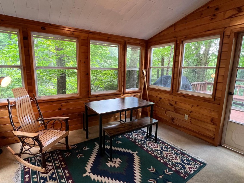 Enjoy breakfast, a puzzle or games on the porch