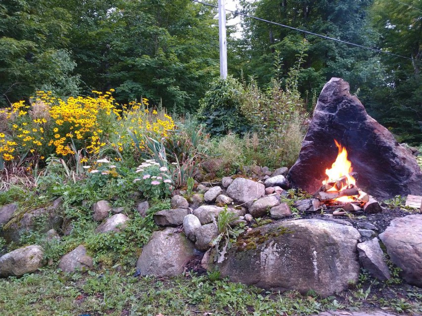 Fire Pit/Stone Next to Upper Garage