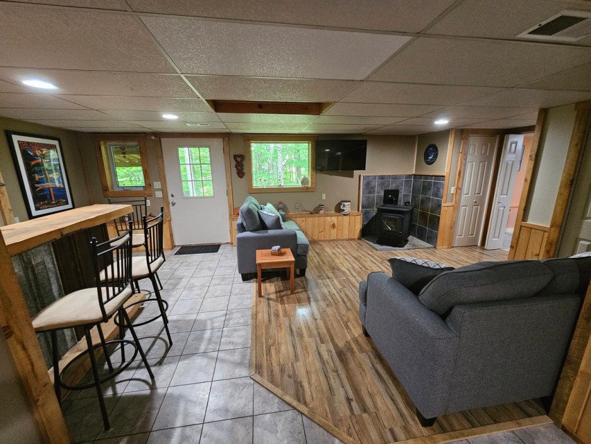 downstairs living room and bar with outside access #2