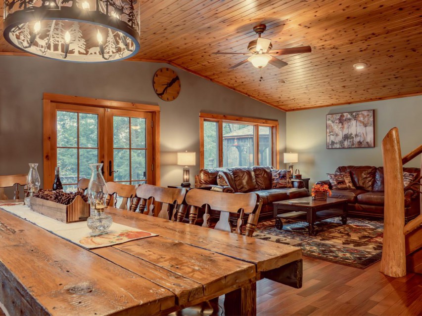 Dining room and living room with French doors to deck.