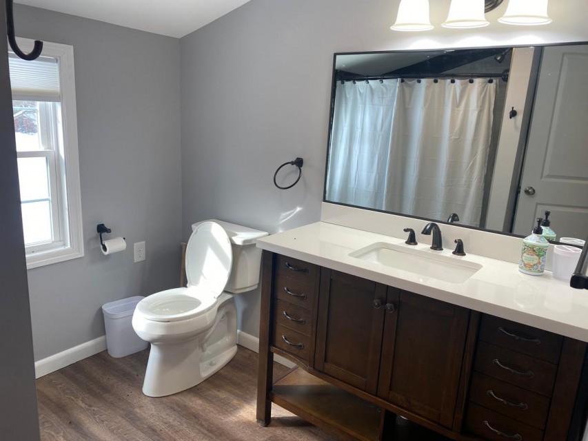 Full bath with tub shower, upstairs