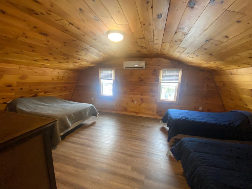 Bedroom with full and two twins