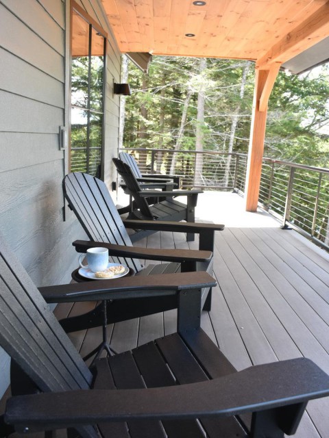 Porch with classic Adirondack chairs