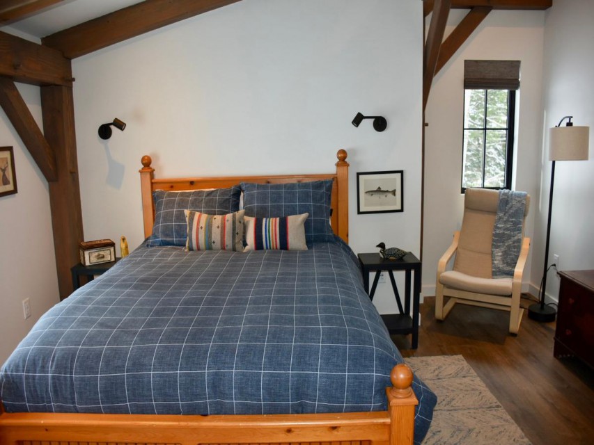 Inviting Queen bedroom with reading chair