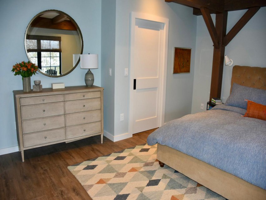Main floor primary bedroom with luxurious bathroom