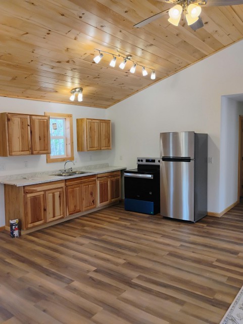 Kitchen with Kenmore stainless steel fridge and stove!