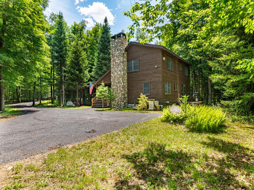 Rare Opportunity! Beautiful cabin on FIVE acres!