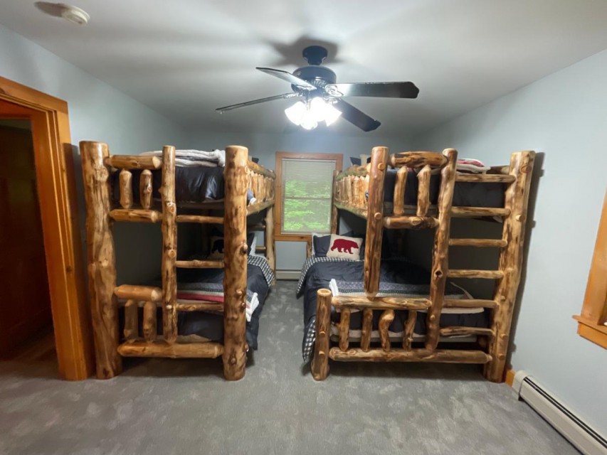 Bunk room upstairs in Main house-1 full & 3 twin