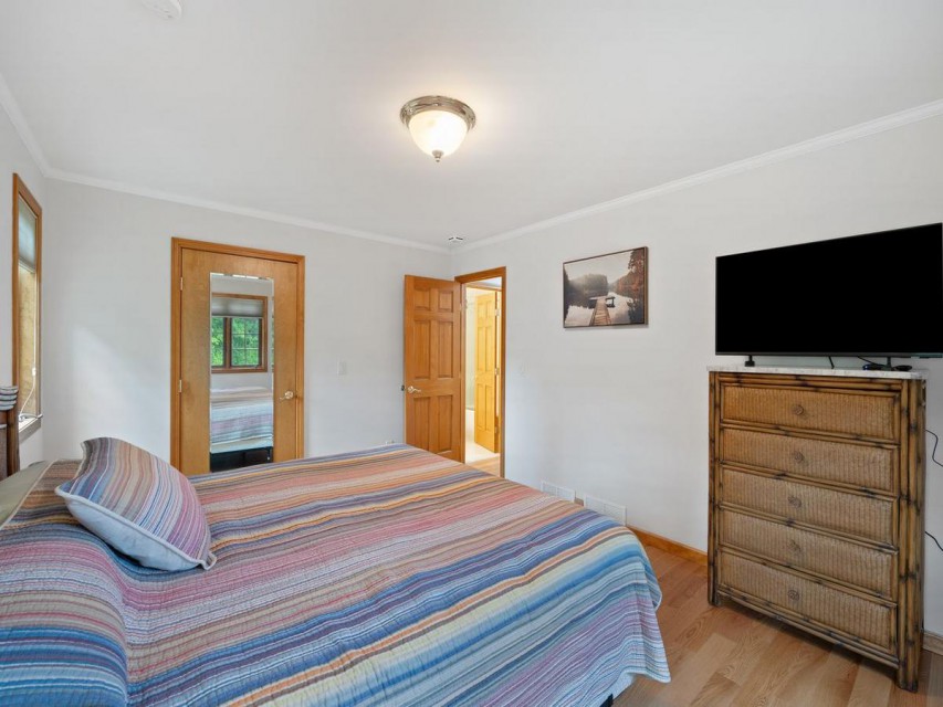 BR- King bed upstairs TV + Walk in closet