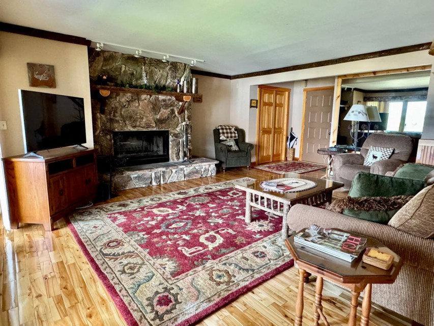 The living room, with great views and a wood fireplace!