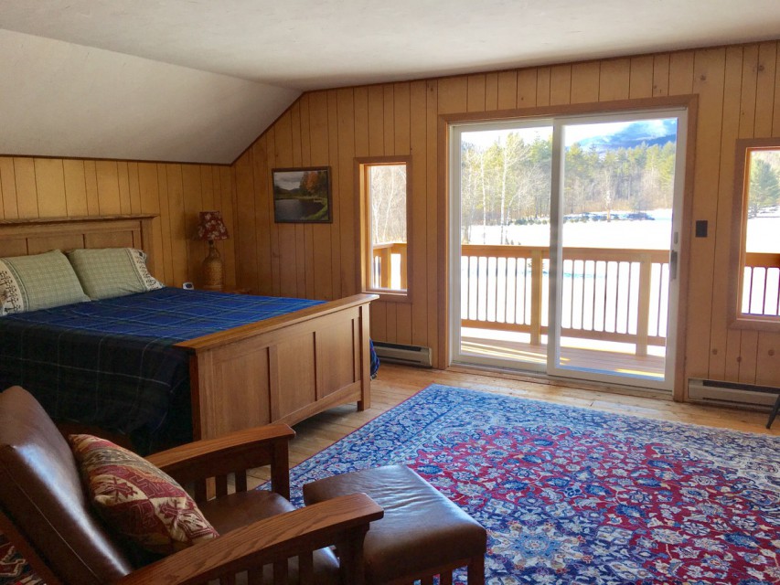 Large second floor bedroom with private balcony.