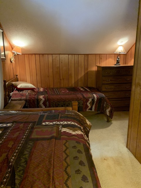 Upstairs bedroom #2 with two twin beds plus trundle