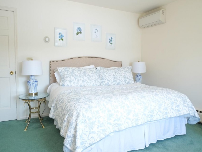 2nd floor bedroom has king size bed and its own balcony