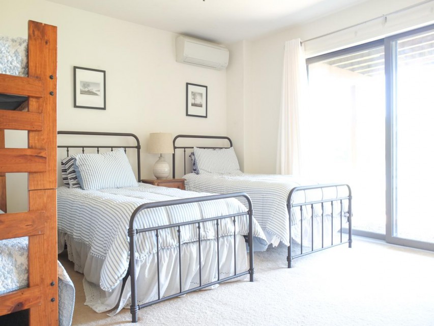 Four twin beds, two can be pushed together for a king. 