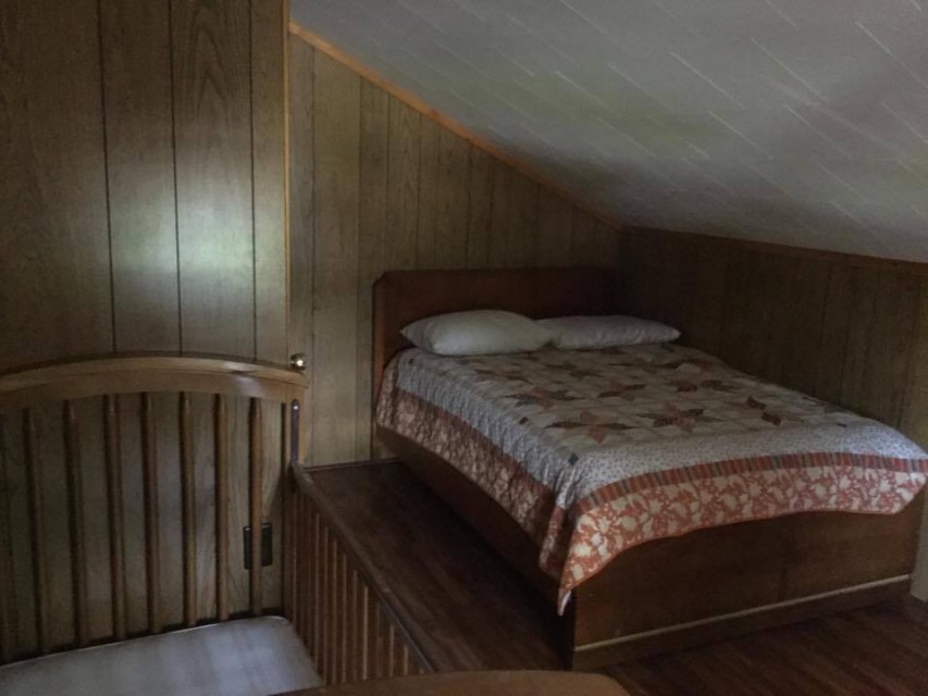 Bedroom #5 with full bed and crib
