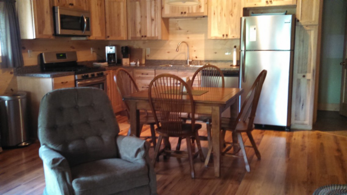 Kitchen area with modern amenities.