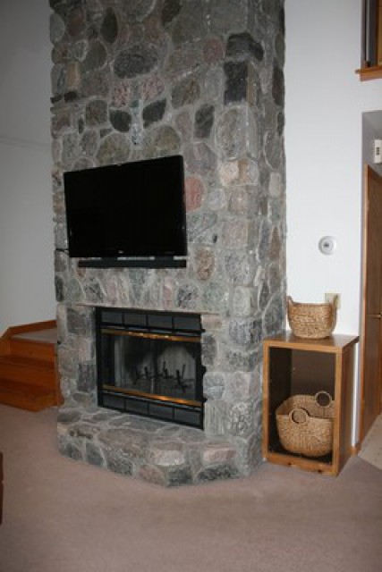 Fireplace and TV in main floor Living Room