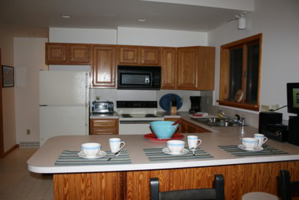 Kitchen with dining counter.