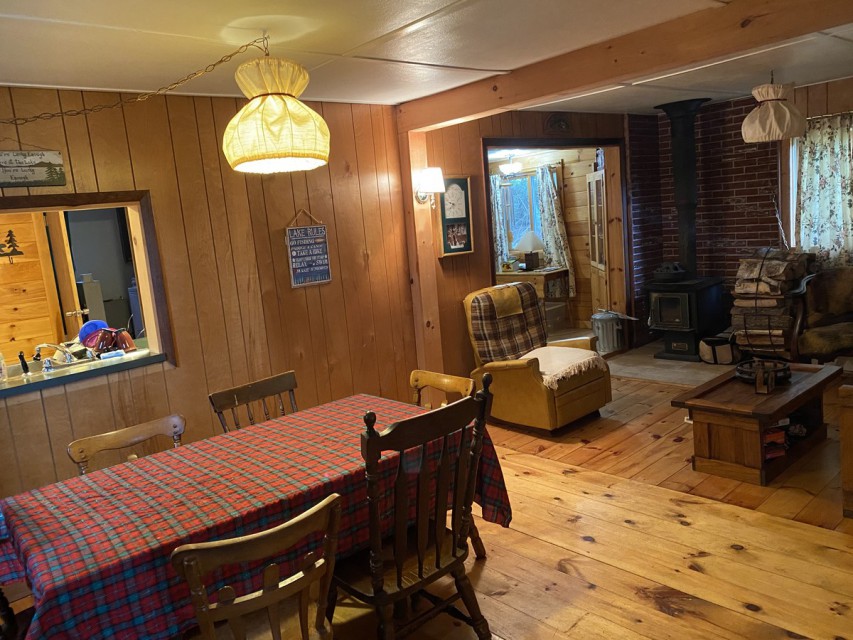 Main Floor Dining / Living Room With Woodburning Stove