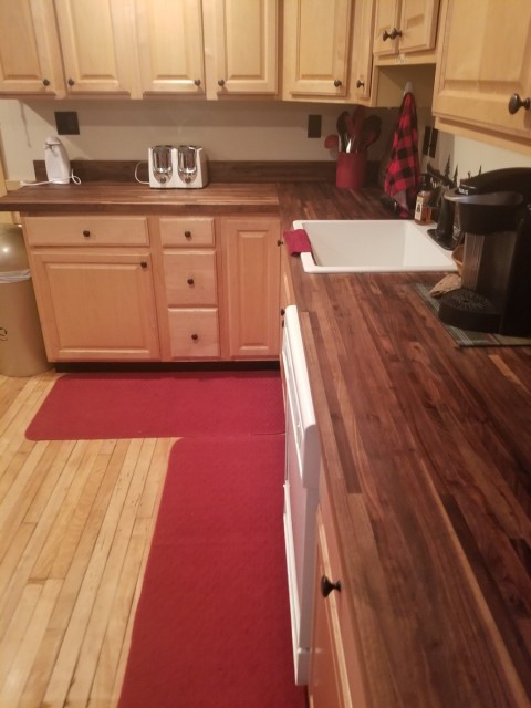kitchen with new butcherblock counters, country sink