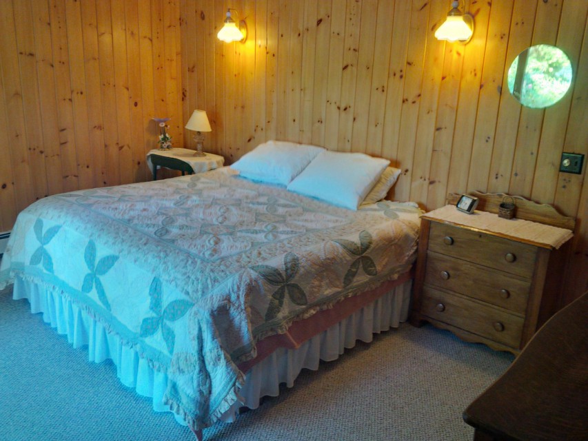 Master bedroom, king bed,with  sliding doors to lake