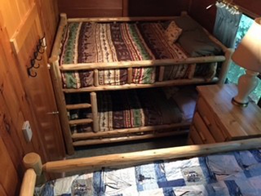 Queen bunkbeds in guest room of house