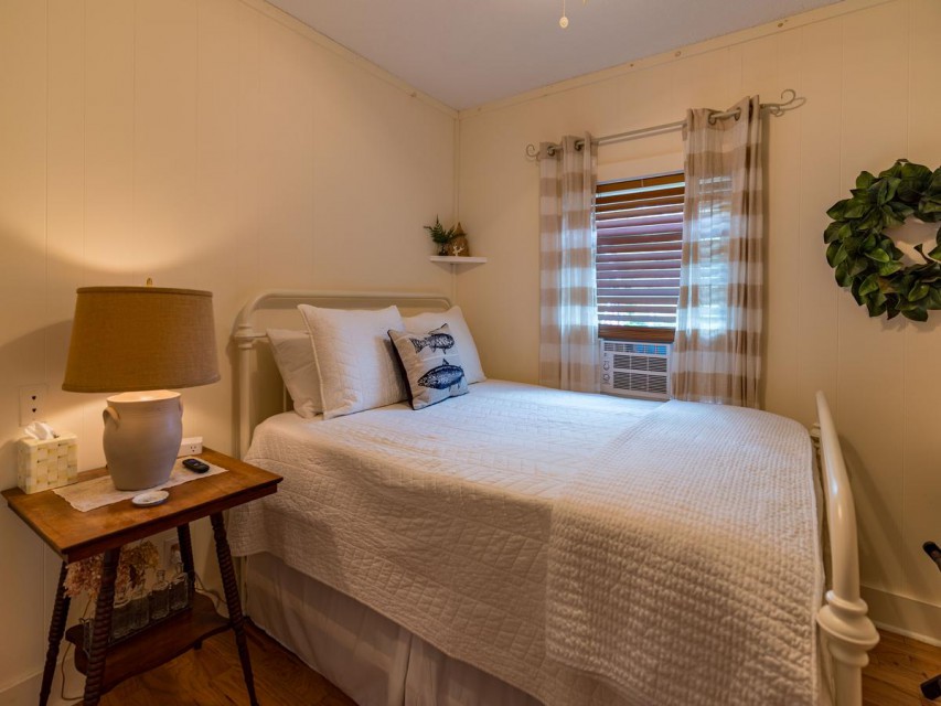1 of 3 bedrooms. Queen bed. 
