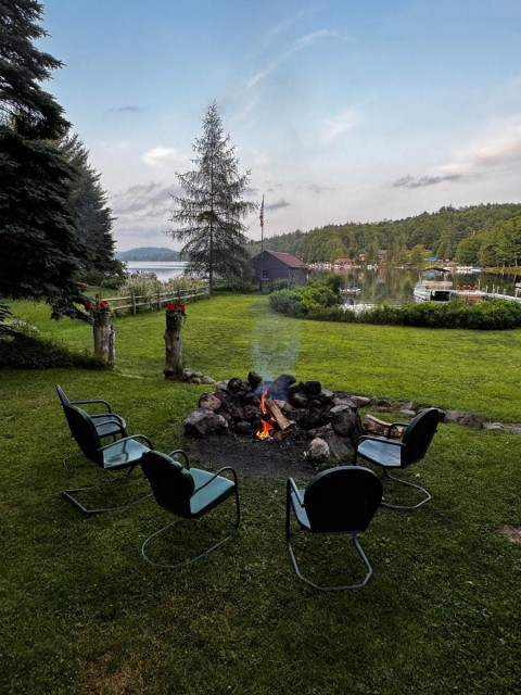 Backyard with fire pit and lakeview