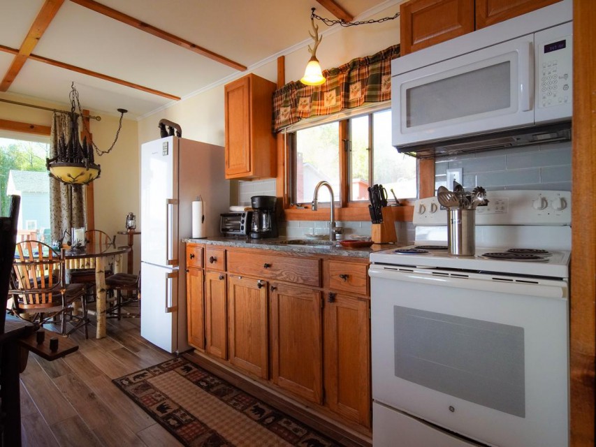 RENOVATED KITCHEN WITH CUSTOM BIRCH DINETTE.